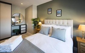 Lettered Board Apartments 1, 2 & 3